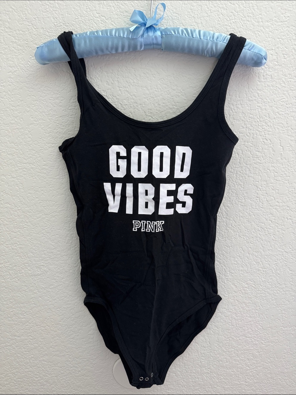 PINK Victoria's Secret Black Kids One-Piece with White "Good Vibes" Logo